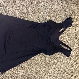 Lululemon workout tank top. Has minimal wear on it and no padding in the top.
